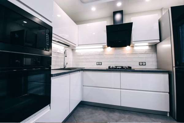 Black Kitchen With White Cabinets