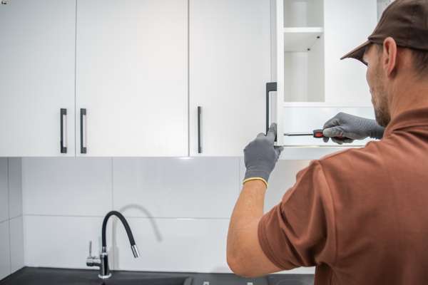 Hanging a second door to a kitchen cabinet